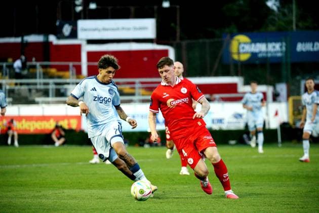 DUBLIN - (lr) Maher Carrizo of Ajax, Kameron Ledwidge of Shelbourne during the UEFA Conference League 3rd qualifying round match between Shelbourne FC and AFC Ajax at Tolka Park Stadium on August 12, 2026 in Dublin, Ireland. JACK MULLINS ANP xVIxANPxSportx xxANPxIVx 565410876 originalFilename: 565410876.jpg