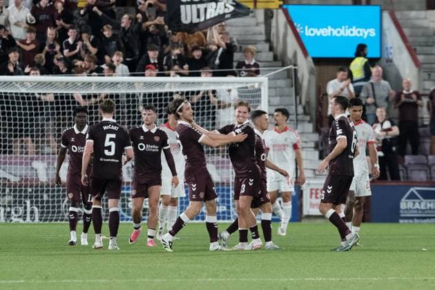UK: Heart of Midlothian v Benfica, Europa League Qualifying Round 3 at Tynecastle Park , Edinburgh, Scotland on 13 August 2026: Pictured: Tomas Magnusson (Hearts) fires a shot past Benfica goalkeeper Samuel Soares to make it 1-0 Edinburgh Tynecastle Park Scotland Copyright: xAlexxToddx