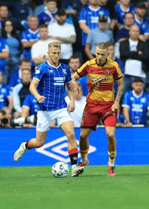 Rangers v Jagiellonia BiaÅ‚ystok UEFA Europa League Ross McCrorie of Rangers shields the ball from Youssuf Sylla of Jagiellonia BiaÅ‚ystok during the UEFA Europa League Third Qualifying Round Second Leg match at Ibrox Stadium, Glasgow 13 08 2026 UK Newspapers OUT Copyright: xFredxPalmerx FIL-23767-0139