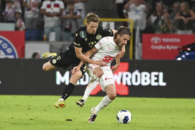 SOCCER - UEFA Europa League - Gornik Zabrze vs. Ferencvaros Photo by IPA ABACAPRESS.COM87455937 - Kristoffer Zachariassen (Fer) and Michal Sacek (Gor) during the UEFA Europa League match between Gornik Zabrze and Ferencvaros at Arena Zabrze in Zabrze, Poland, on August 13, 2026 Zabrze Poland  Copyright: xIPAxSport ABACAx
