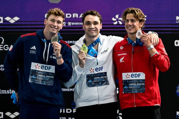 Maxime Grousset of France, silver, Kristof Milak of Hungary, gold and new european record, Noe Ponti of Switzerland, bronze show the medals after competing in the swimming 100m Butterfly Men Final during the European Aquatics Championships at the Olympic Aquatic Center in Paris (France), August 13, 2026. Giorgio Scala DBM - Deepbluemedia Insidefoto