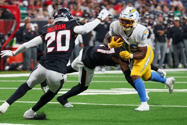 HOUSTON, TX - AUGUST 13: Running Back Amar Johnson of the Los Angeles Chargers runs for a touchdown after breaking a tackle attempt by nickelback Brandon Codrington of the Houston Texans during the NFL, American Football Herren, USA preseason game between Houston Texans and Los Angeles Chargers on August 13, 2026, at Reliant Stadium in Houston, TX. (Photo by David Buono Icon Sportswire) NFL: AUG 13 Chargers at Texans EDITORIAL USE ONLY Icon260813018