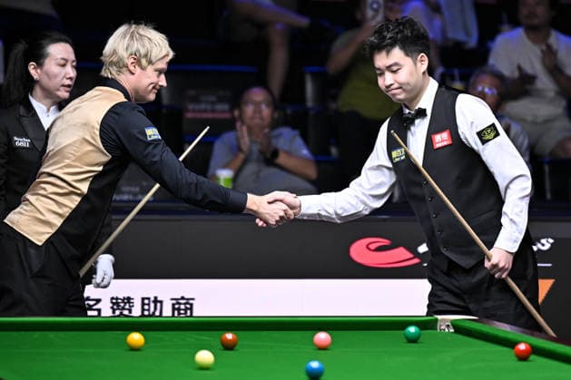 TAIYUAN, CHINA - AUGUST 13: Si Jiahui of China shakes hands with Neil Robertson of Australia after the second round match on day 6 of the 2026 World Snooker Tour China Open at Taiyuan Binhe Sports Center on August 13, 2026 in Taiyuan, Shanxi Province of China.  Copyright: xChinaxNewsxServicex 111659761208