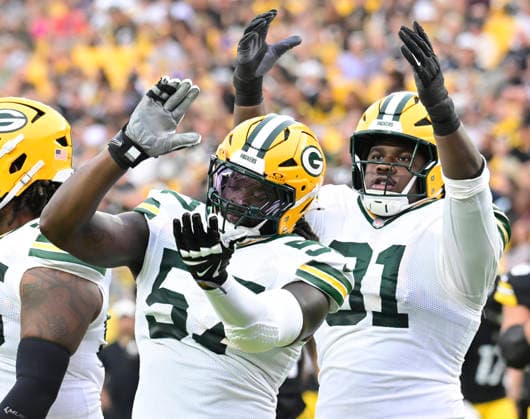 Green Bay Packers defensive end Brenton Cox Jr. (57) celebrates his sack of Pittsburgh Steelers quarterback Mason Rudolph (2) during the first quarter at Acrisure Stadium on Thursday, August 13, 2026 in Pittsburgh.  PIT2026081305 ARCHIExCARPENTER
