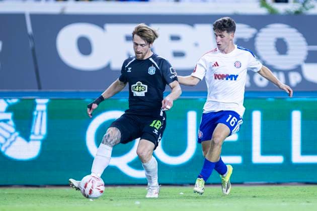 August 13, 2026, Split, Dalmatia, Croatia: Deividas Sesplaukis (FK Zalgiris) 18 in action with the ball during the second leg of the UEFA Europa Conference League third qualifying round match between HNK Hajduk Split (CRO) and FK Zalgiris (LTU) at Poljud Stadium. On photo Deividas Sesplaukis (FK Zalgiris) 18 and Andelo Sutalo (HNK Hajduk Split) 16. UEFA Conference League Third Qualifying Round: HNK HAJDUK SPLIT - FK Zalgiris 4:0  - ZUMAp210 20260813_zsp_p210_002 Copyright: xMajaxPrgometx
