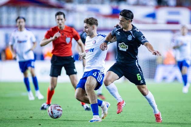 August 13, 2026, Split, Dalmatia, Croatia: Adrion Pajaziti (HNK HAJDUK SPLIT) 4 in action with the ball during the second leg of the UEFA Europa Conference League third qualifying round match between HNK Hajduk Split (CRO) and FK Zalgiris (LTU) at Poljud Stadium. On photo Adrion Pajaziti (HNK HAJDUK SPLIT) 4 and Marko Capan (FK Zalgiris) 6. UEFA Conference League Third Qualifying Round: HNK HAJDUK SPLIT - FK Zalgiris 4:0  - ZUMAp210 20260813_zsp_p210_015 Copyright: xMajaxPrgometx