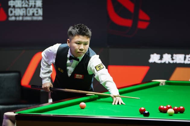 TAIYUAN, CHINA - AUGUST 14: Zhou Yuelong of China plays a shot in the Quarterfinal match against David Gilbert of England on day 7 of the 2026 World Snooker Tour China Open at Taiyuan Binhe Sports Center on August 14, 2026 in Taiyuan, Shanxi Province of China.  Copyright: xTaixChengzhex 111659923295
