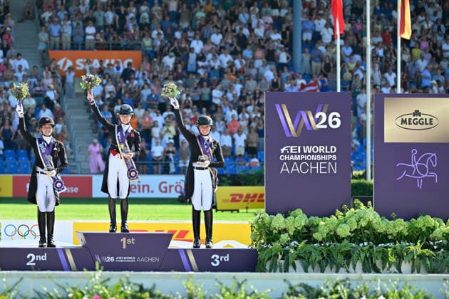Aachen, Hauptstadion, 14.08.26, GER, FEI World Championships Aachen 2026, Meggle-Preis, Grand Prix Special Dressur Bild: Siegerehrung v.li. Cathrine LAUDRUP-DUFOUR (Daenemark, Silber), Charlotte FRY (Grossbritannien, Gold) und Katharina HEMMER (Deutschland, Gold) Nordrhein-Westfalen Deutschland *** Aachen, Main Stadium, August 14, 2026, GER, FEI World Championships Aachen 2026, Meggle Prize, Grand Prix Special Dressage Photo: Award ceremony (from left) Cathrine LAUDRUP DUFOUR, Denmark, silver; Charlotte FRY, Great Britain, gold; and Katharina HEMMER, Germany, gold; North Rhine-Westphalia, Germany