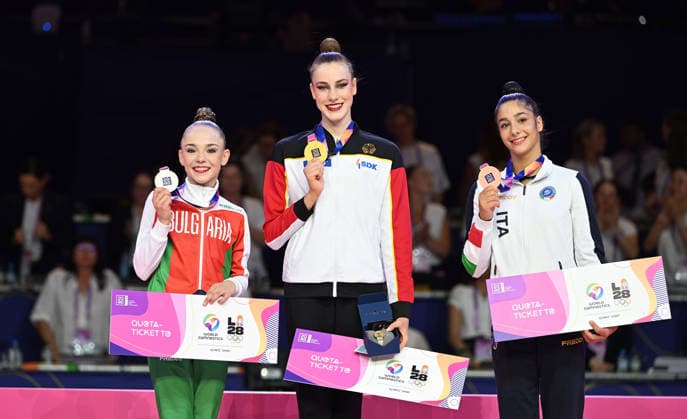 14.08.2026, xhbx, Rhythmische Sportgymnastik Weltmeisterschaft 2026, v.l. Stiliana Nikolova (Bulgarien), Darja Varfolomeev (Deutschland), Sofia Raffaeli (Italien), Siegerehrung (DFL DFB REGULATIONS PROHIBIT ANY USE OF PHOTOGRAPHS as IMAGE SEQUENCES and or QUASI-VIDEO) Frankfurt am Main *** August 14, 2026, xhbx, 2026 Rhythmic Gymnastics World Championships, from left: Stiliana Nikolova (Bulgaria), Darja Varfolomeev, Germany; Sofia Raffaeli, Italy; Award Ceremony. DFL and DFB regulations prohibit any use of photographs as image sequences and or quasi-video. Frankfurt am Main