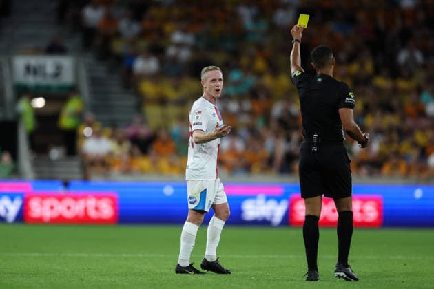 Wolverhampton, England, 14th August 2026. Adam Forshaw of Blackburn Rovers is shown a yellow card by referee Farai Hallam during the Wolverhampton Wanderers vs Blackburn Rovers Sky Bet Championship match at Molineux, Wolverhampton. Picture credit should read: Gareth Evans Sportimage EDITORIAL USE ONLY. No use with unauthorised audio, video, data, fixture lists, club league logos or live services. Online in-match use limited to 120 images, no video emulation. No use in betting, games or single club league player publications. SPI_064_GE_WOL_vs_BBR SPI-4907-0063