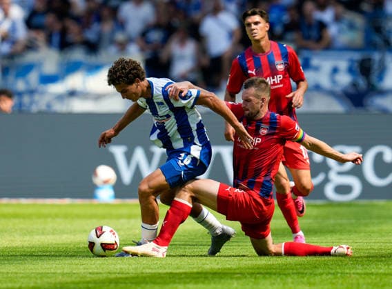Soufian Gouram (Hertha BSC, 33) im Zweikampf mit Patrick Mainka (1. FC Heidenheim 1846, 6). GER, Hertha BSC vs 1.FC Heidenheim 1846, 2. Bundesliga, 2. Spieltag, Saison 2026-27, 15.08.2026 DFL REGULATIONS PROHIBIT ANY USE OF PHOTOGRAPHS AS IMAGE SEQUENCES AND OR QUASI-VIDEO GER, Hertha BSC vs 1.FC Heidenheim 1846, 2. Bundesliga, 2. Spieltag, Saison 2026-27, 15.08.2026 Berlin *** Soufian Gouram (Hertha BSC), 33, in a tackle with Patrick Mainka (1 FC Heidenheim 1846), 6 GER, Hertha BSC vs. 1 FC Heidenheim 1846, 2. Bundesliga, Matchday 2, 2026–27 season, August 15, 2026. DFL regulations prohibit any use of photographs as image sequences and or quasi-video. GER, Hertha BSC vs. 1 FC Heidenheim 1846, 2. Bundesliga, Matchday 2, 2026–27 season, August 15, 2026, Berlin Copyright: xEibner-Pressefoto ScottxColemanx EP_SCN