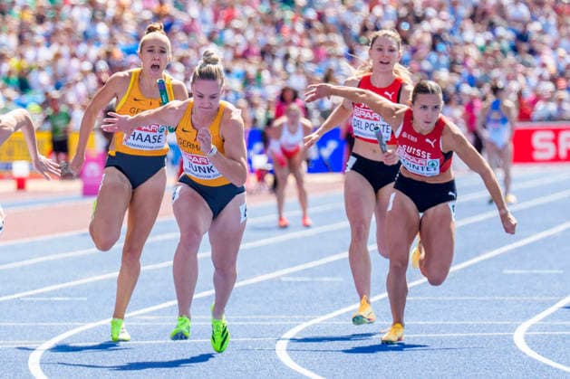 BIRMINGHAM, GREAT BRITAIN - AUGUST 15, 2026 : Rebekka HAASE (GER Germany) and Sophia JUNK (GER Germany) for Germany and Ajla DEL PONTE (SUI Switzerland) and Léonie POINTET (SUI Switzerland) for Switzerland competing in the 4x100m relay heats during the European Athletics Championships at Alexander Stadium on August 15, 2026 in Birmingham, Great Britain. Great Britain Copyright: xLeahxKohringx