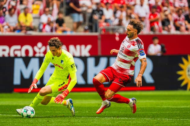 Lukas Petersson (TSG Hoffenheim II, 01) rettet vor Fabian Schleusener (Fortuna Düsseldorf, 24) Fortuna Duesseldorf vs. TSG Hoffenheim II, Fussball, 3.Liga, 02.Spieltag, Saison 2026 27, 15.08.2026, DFL REGULATIONS PROHIBIT ANY USE OF PHOTOGRAPHS AS IMAGE SEQUENCES AND OR QUASI-VIDEO, Fortuna Duesseldorf vs. TSG Hoffenheim II, Fussball, 3.Liga, 2.Spieltag, Saison 2026 27, 15.08.2026 Düsseldorf *** Lukas Petersson (TSG Hoffenheim II), 01, makes a save against Fabian Schleusener (Fortuna Düsseldorf), 24; Fortuna Düsseldorf vs. TSG Hoffenheim II, Soccer, 3rd Division, Matchday 02, 2026–27 Season, August 15, 2026, DFL regulations prohibit any use of photographs as image sequences and or quasi-video, Fortuna Düsseldorf vs. TSG Hoffenheim II, soccer, 3. Liga, Matchday 2, 2026–27 Season, August 15, 2026, Düsseldorf Copyright: xEibner-Pressefoto LukasxBaldygax EP_LBA
