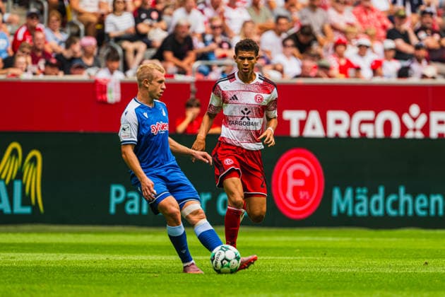 Valentin Laessig (TSG Hoffenheim II, 06) spielt einen Pass vor Jordi Paulina (Fortuna Düsseldorf, 27) Fortuna Duesseldorf vs. TSG Hoffenheim II, Fussball, 3.Liga, 02.Spieltag, Saison 2026 27, 15.08.2026, DFL REGULATIONS PROHIBIT ANY USE OF PHOTOGRAPHS AS IMAGE SEQUENCES AND OR QUASI-VIDEO, Fortuna Duesseldorf vs. TSG Hoffenheim II, Fussball, 3.Liga, 2.Spieltag, Saison 2026 27, 15.08.2026 Düsseldorf *** Valentin Laessig (TSG Hoffenheim II, No. 06) plays a pass to Jordi Paulina (Fortuna Düsseldorf, No. 27). Fortuna Düsseldorf vs. TSG Hoffenheim II, soccer, 3. Liga, Matchday 2, 2026–27 season, August 15, 2026, DFL regulations prohibit any use of photographs as image sequences and or quasi-video, Fortuna Düsseldorf vs. TSG Hoffenheim II, soccer, 3. Liga, Matchday 2, 2026–27 Season, August 15, 2026, Düsseldorf Copyright: xEibner-Pressefoto LukasxBaldygax EP_LBA