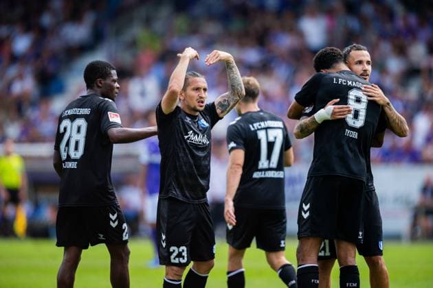 15.08.2026 - Fußball, 2026 2027, 2. Bundesliga, 2. Spieltag, VfL Osnabrück - 1. FC Magdeburg: (2R) Emmanuel Iyoha (Magdeburg) jubelt nach seinem Tor zum 0:3 mit Pierre Nadjombe (Magdeburg), Baris Atik (Magdeburg), Alexander Nollenberger (Magdeburg), Falko Michel (Magdeburg) DFL REGULATIONS PROHIBIT ANY USE OF PHOTOGRAPHS AS IMAGE SEQUENCES AND OR QUASI-VIDEO. *** August 15, 2026 Soccer, 2026–2027, 2. Bundesliga, Matchday 2, VfL Osnabrück 1 FC Magdeburg 2R Emmanuel Iyoha of Magdeburg celebrates after scoring the goal that made it 0–3 with Pierre Nadjombe of Magdeburg, Baris Atik of Magdeburg, Alexander Nollenberger (Magdeburg), Falko Michel (Magdeburg). DFL regulations prohibit any use of photographs as image sequences and or quasi-video.