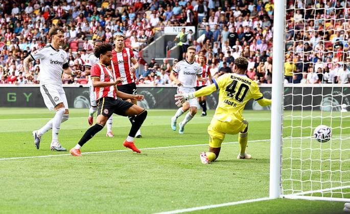 Kevin Schade of Brentford scores the opening goal Brentford v Eintracht Frankfurt, Pre Season Friendly, Football, Gtech Community Stadium, London, UK - 15 Aug 2026London Gtech Community Stadium United Kingdom EDITORIAL USE ONLY No use with unauthorised audio, video, data, fixture lists, club league logos or live services. Online in-match use limited to 120 images, no video emulation. No use in betting, games or single club league player publications.  Copyright: xMichaelxZemanek Shutterstockx 17070130a