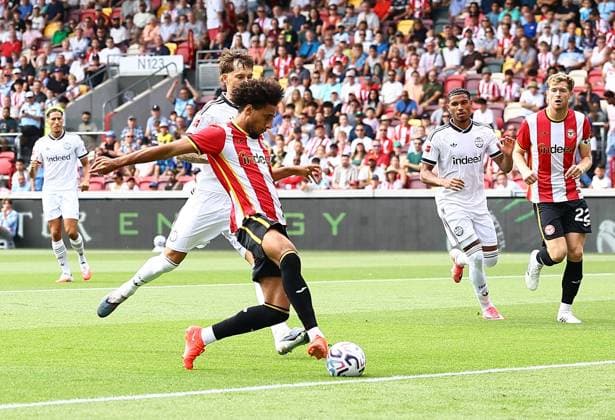 Kevin Schade of Brentford scores the opening goal Brentford v Eintracht Frankfurt, Pre Season Friendly, Football, Gtech Community Stadium, London, UK - 15 Aug 2026London Gtech Community Stadium United Kingdom EDITORIAL USE ONLY No use with unauthorised audio, video, data, fixture lists, club league logos or live services. Online in-match use limited to 120 images, no video emulation. No use in betting, games or single club league player publications.  Copyright: xMichaelxZemanek Shutterstockx 17070130n