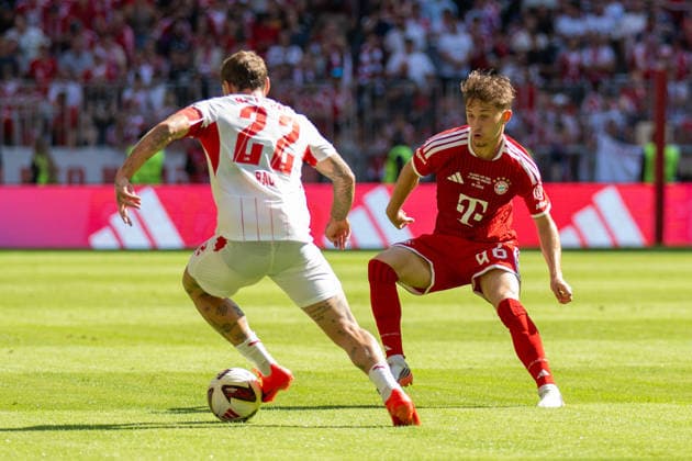 David Raum 22 (RB Leipzig), Tim Binder 46 (FC Bayern Muenchen), FC Bayern Muenchen - RB Leipzig, Fussball, Telekom Cup, Freundschaftsspiel, 15.08.2026 DFB regulations prohibit any use of photographs as image sequences and or quasi-video Muenchen Bayern Deutschland *** David Raum 22 RB Leipzig, Tim Binder 46 FC Bayern Munich, FC Bayern Munich RB Leipzig, soccer, Telekom Cup, friendly match, August 15, 2026. DFB regulations prohibit any use of photographs as image sequences and or quasi-video. Munich, Bayern, Germany Copyright: xkolbert-press UlrichxGamelx