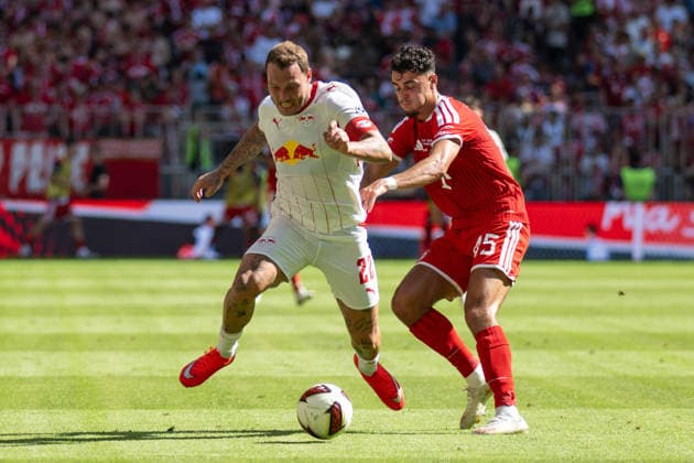 David Raum 22 (RB Leipzig) im Zweikampf mit Aleksandar Pavlovic 45 (FC Bayern Muenchen), FC Bayern Muenchen - RB Leipzig, Fussball, Telekom Cup, Freundschaftsspiel, 15.08.2026 DFB regulations prohibit any use of photographs as image sequences and or quasi-video Muenchen Bayern Deutschland *** David Raum (22, RB Leipzig) in a tackle with Aleksandar Pavlovic (45, FC Bayern Munich), FC Bayern Munich vs. RB Leipzig, soccer, Telekom Cup, friendly match, August 15, 2026. DFB regulations prohibit any use of photographs as image sequences and or quasi-video. Munich, Bayern, Germany Copyright: xkolbert-press UlrichxGamelx