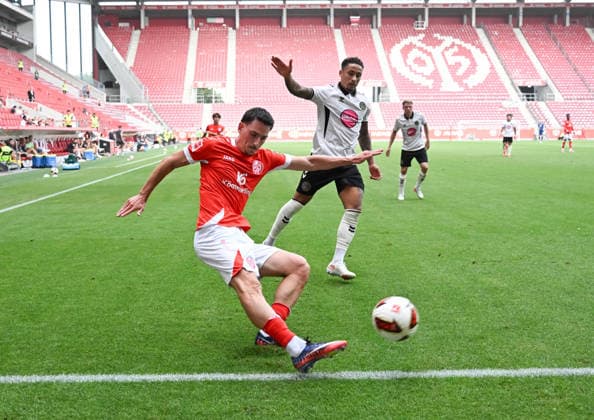 15.08.2026, xsltx, Fussball Testspiel, FSV Mainz 05 - AFC Bournemouth v.l. Anthony Caci (1. FSV Mainz 05) (DFL DFB REGULATIONS PROHIBIT ANY USE OF PHOTOGRAPHS as IMAGE SEQUENCES and or QUASI-VIDEO) *** August 15, 2026, xsltx, soccer friendly match, FSV Mainz 05 vs. AFC Bournemouth, Anthony Caci 1, FSV Mainz 05. DFL and DFB regulations prohibit any use of photographs as image sequences and or quasi-video.
