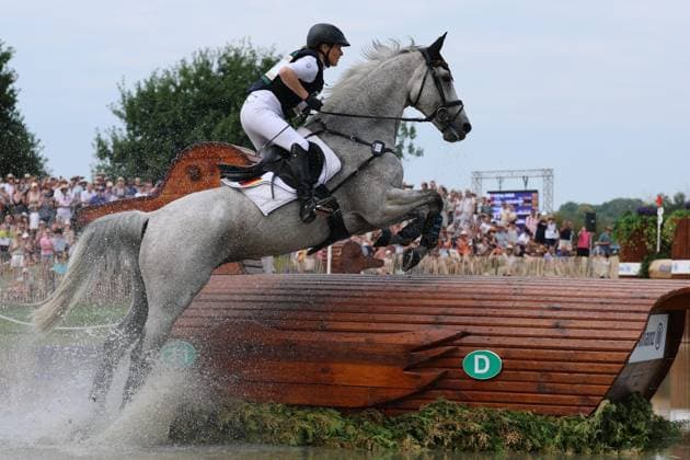 Malin Hansen-Hotopp (GER, Deutschland, Germany) mit Pferd Carlitos Quidditch K, Allianz Versicherung, Wasserhindernis , Vielseitigkeit Dressur, FEI Eventing World Championship, WM, Weltmeisterschaft , DHL-Preis, Einzel Mannschaft, Geländeprüfung, Teilprüfung Gelände, Cross Country , AACHEN - FEI World Championships 2026, Weltfest des Pferdesports, Reitsport Weltmeisterschaft 2026, Aachen 2026, Welcome Home 2026, Aachener Soers, 11. bis 23. August 2026, Reitsport, 15.08.2026, Aachen Aachener Soers Deutschland *** Malin Hansen Hotopp GER, Germany, with her horse Carlitos Quidditch K, Allianz Insurance, Water Jumping, Eventing Dressage, FEI Eventing World Championship, DHL Prize, Individual and Team, Cross-Country, Cross-Country Stage, AACHEN FEI World Championships 2026, World Festival of Equestrian Sports, 2026 Equestrian World Championships, Aachen 2026, Welcome Home 2026, Aachen Soers, August 11–23, 2026, Equestrian Sports, August 15, 2026, Aachen Soers, Germany