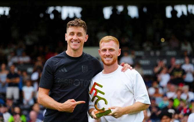 Tom Cairney presents Harrison Reed of Fulham with his goal of the dseason trophy Fulham v Stuttgart, Pre Season Friendly, Football, Craven Cottage, London, UK - 15 Aug 2026London Craven Cottage United Kingdom EDITORIAL USE ONLY No use with unauthorised audio, video, data, fixture lists, club league logos or live services. Online in-match use limited to 120 images, no video emulation. No use in betting, games or single club league player publications.  Copyright: xJavierxGarcia Shutterstockx 17070137ak