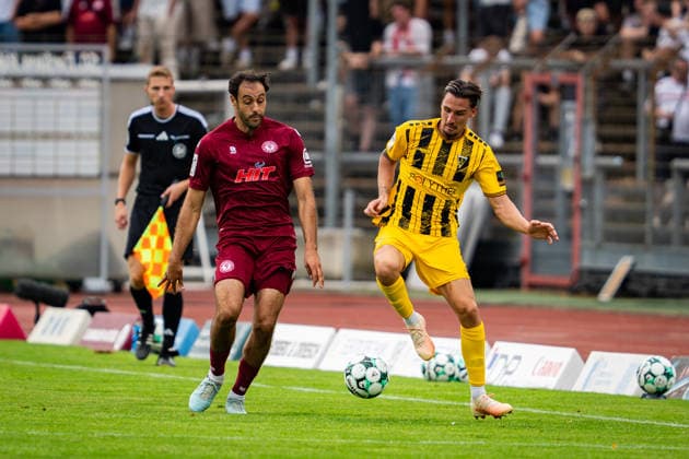 Hamadi Al Ghaddioui (SC Fortuna Koeln, 18) gegen Petros Bagkalianis (Alemannia Aachen, 02) SC Fortuna Koeln vs. Alemannia Aachen, Fussball, 3. Liga, 2. Spieltag, Saison 2026 2027, 15.08.2026 DFB REGULATIONS PROHIBIT ANY USE OF PHOTOGRAPHS AS IMAGE SEQUENCES AND OR QUASI-VIDEO SC Fortuna Koeln vs. Alemannia Aachen, Fussball, 3. Liga, 2. Spieltag, Saison 2026 2027, 15.08.2026 Koeln *** Hamadi Al Ghaddioui, SC Fortuna Cologne, 18, vs. Petros Bagkalianis, Alemannia Aachen, 02; SC Fortuna Cologne vs. Alemannia Aachen, Soccer, 3rd Division, Matchday 2, 2026–2027 Season, August 15, 2026 DFB regulations prohibit any use of photographs as image sequences and or quasi-video SC Fortuna Cologne vs. Alemannia Aachen, soccer, 3. Liga, Matchday 2, 2026–2027 Season, August 15, 2026, Cologne Copyright: xEibner-Pressefoto J.xDerondeaux EP_JDU