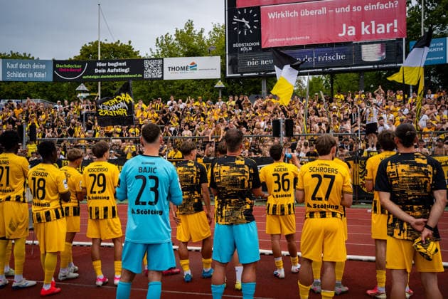 Die Mannschaft nach dem Unentschieden vor der Kurve SC Fortuna Koeln vs. Alemannia Aachen, Fussball, 3. Liga, 2. Spieltag, Saison 2026 2027, 15.08.2026 DFB REGULATIONS PROHIBIT ANY USE OF PHOTOGRAPHS AS IMAGE SEQUENCES AND OR QUASI-VIDEO SC Fortuna Koeln vs. Alemannia Aachen, Fussball, 3. Liga, 2. Spieltag, Saison 2026 2027, 15.08.2026 Koeln *** The team after the tie in front of the stands: SC Fortuna Cologne vs. Alemannia Aachen, soccer, 3rd Division, Matchday 2, 2026–2027 season, August 15, 2026 DFB regulations prohibit any use of photographs as image sequences and or quasi-video SC Fortuna Cologne vs. Alemannia Aachen, soccer, 3. Liga, Matchday 2, 2026–2027 season, August 15, 2026, Cologne Copyright: xEibner-Pressefoto J.xDerondeaux EP_JDU