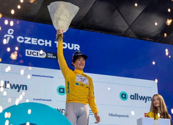 Czech Tour cycling race, Stage 3, at Dlouhe strane, Loucna nad Desnou, Czech Republic, on August 15, 2026. Stage winner Andrew August of Netcompany INEOS team on the podium. (CTKxPhoto StanislavxHelona) CTKPhotoP2026081504397  CTKPhotoP2026081504397