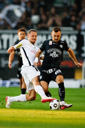 SOCCER - BL, Sturm vs Altach GRAZ,AUSTRIA,15.AUG.26 - SOCCER - ADMIRAL Bundesliga, SK Sturm Graz vs SCR Altach. Image shows Patrick Sebastian Greil (Altach) and Juergen Heil (Sturm).  GEPAxpictures xJamesxDoak