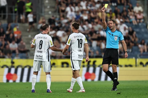SOCCER - BL, Sturm vs Altach GRAZ,AUSTRIA,15.AUG.26 - SOCCER - ADMIRAL Bundesliga, SK Sturm Graz vs SCR Altach. Image shows Mike-Steven Baehre, Patrick Greil (Altach) and referee Florian Jaeger.  GEPAxpictures xChrisxBauer