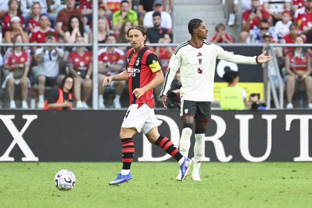 SOCCER - Friendly Match - Manchester United, ManU vs. AC Milan Photo by IPA ABACAPRESS.COM87510782 - Luka Modric (Milan) and Marcus Rashford during the friendly match between Manchester United and AC Milan at the Arena Tarczynski in Wroclaw, Poland, on August 15, 2026 Wroclaw Poland  Copyright: xIPAxSport ABACAx