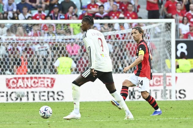 SOCCER - Friendly Match - Manchester United, ManU vs. AC Milan Photo by IPA ABACAPRESS.COM87510769 - Marcus Rasford and Luka Modric (Milan) during the friendly match between Manchester United and AC Milan at the Arena Tarczynski in Wroclaw, Poland, on August 15, 2026 Wroclaw Poland  Copyright: xIPAxSport ABACAx