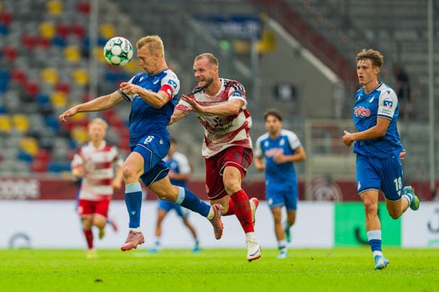 Valentin Laessig (TSG Hoffenheim II, 06) spielt den Ball mit dem Kopf vor dem anstuermenden Eric Hottmann (Fortuna Düsseldorf, 09), Lion Wagenbach (TSG Hoffenheim II, 18) Fortuna Duesseldorf vs. TSG Hoffenheim II, Fussball, 3.Liga, 02.Spieltag, Saison 2026 27, 15.08.2026 DFL REGULATIONS PROHIBIT ANY USE OF PHOTOGRAPHS AS IMAGE SEQUENCES AND OR QUASI-VIDEO, Fortuna Duesseldorf vs. TSG Hoffenheim II, Fussball, 3.Liga, 2.Spieltag, Saison 2026 27, 15.08.2026 Düsseldorf *** Valentin Laessig of TSG Hoffenheim II, No. 06, heads the ball past the onrushing Eric Hottmann of Fortuna Düsseldorf, 09, Lion Wagenbach (TSG Hoffenheim II, 18). Fortuna Düsseldorf vs. TSG Hoffenheim II, soccer, 3. Liga, Matchday 2, 2026–27 season, August 15, 2026 DFL regulations prohibit any use of photographs as image sequences and or quasi-video, Fortuna Düsseldorf vs. TSG Hoffenheim II, soccer, 3. Liga, Matchday 2, 2026–27 Season, August 15, 2026, Düsseldorf Copyright: xEibner-Pressefoto LukasxBaldygax EP_LBA