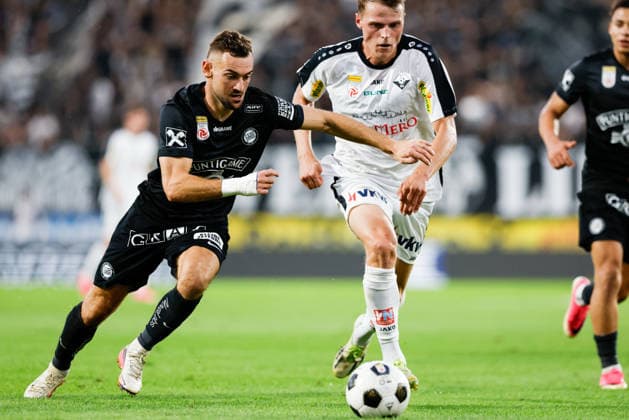 SOCCER - BL, Sturm vs Altach GRAZ,AUSTRIA,15.AUG.26 - SOCCER - ADMIRAL Bundesliga, SK Sturm Graz vs SCR Altach. Image shows Juergen Heil (Sturm) and Benjamin Bockle (Altach).  GEPAxpictures xJamesxDoak