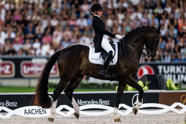 260815 Nadja Aaboe Sloth of Denmark with horse Favour Gersdorf compete in the Dressage Grand Prix Freestyle during day 5 of the 2026 FEI World Championships on August 15, 2026 in Aachen. Photo: Emma Wallskog BILDBYRAN kod EW EW0684 ridsport equestrian rid-vm 2026 2026 fei world championships bbeng ridsport-vm dressage dressyr kur *** August 15, 2026: Nadja Aaboe Sloth of Denmark, riding Favour Gersdorf, competes in the Dressage Grand Prix Freestyle on Day 5 of the 2026 FEI World Championships on August 15, 2026 in Aachen. Photo by Emma Wallskog, BILDBYRAN, code EW EW0684. equestrian sports, 2026 World Championships, 2026 FEI World Championships, BBENG, equestrian sports, World Championships, dressage, freestyle  Copyright: EMMAxWALLSKOG BB260815EW119