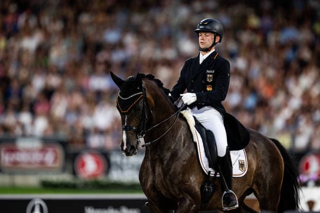 260815 Raphael Netz of Germany with horse Great Escape Camelot compete in the Dressage Grand Prix Freestyle during day 5 of the 2026 FEI World Championships on August 15, 2026 in Aachen. Photo: Emma Wallskog BILDBYRAN kod EW EW0684 ridsport equestrian rid-vm 2026 2026 fei world championships bbeng ridsport-vm dressage dressyr kur *** August 15, 2026: Raphael Netz of Germany, riding Great Escape Camelot, competes in the Dressage Grand Prix Freestyle on Day 5 of the 2026 FEI World Championships on August 15, 2026 in Aachen. Photo by Emma Wallskog. BILDBYRAN code EW EW0684 equestrian sports 2026 World Championships 2026 FEI World Championships BBENG equestrian sports World Championships dressage freestyle routine  Copyright: EMMAxWALLSKOG BB260815EW123