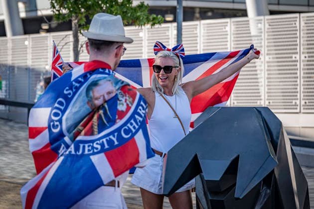 RECORD DATE NOT STATED 15th August 2026; Alexander Stadium, Birmingham, Midlands, England; 2026 European Athletics Championships, Day Six; Fans pose with Union Jack flags by the bull statue GodfreyxPitt
