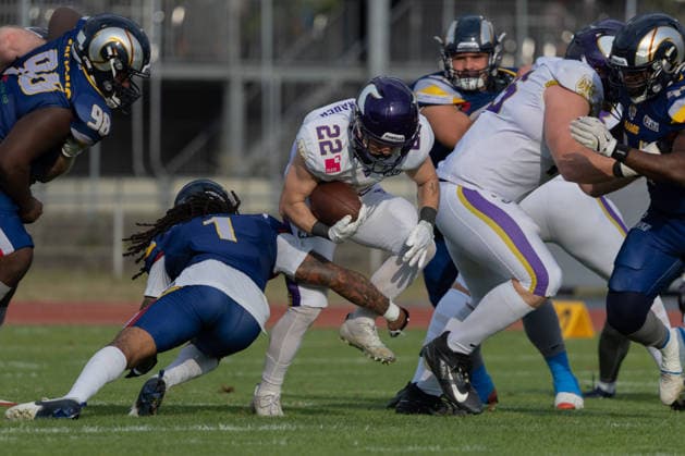 Vienna Vikings player Albert Wiesigstrauch carries the football while driving forward through contact as Alpine Rams defender Cameron Bergeron attempts a tackle during live game action. Vienna Vikings at Alpine Rams, American Football, American Football League Europe, Week 13, 2026, 8.8.2026, Copyright: xPFA RicoxDoninellix