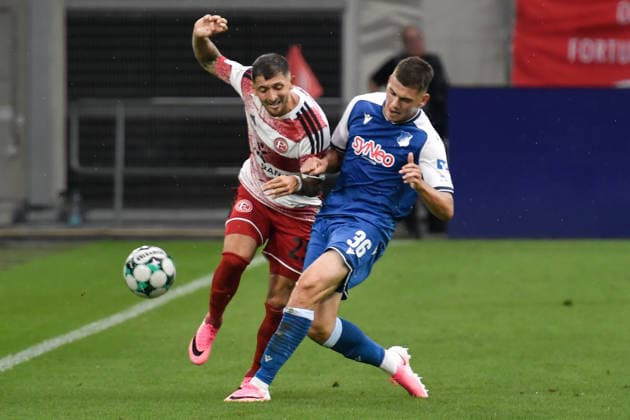 v. li. im Zweikampf Matthias Zimmermann (Duesseldorf 25) Jakov Dedic (Hoffenheim 36) 15.08.2026 ¢ Fussball ¢ Fortuna Duesseldorf vs TSG 1899 Hoffenheim II, Merkur Spiel-Arena, Duesseldorf, DFB DFL REGULATIONS PROHIBIT ANY USE OF PHOTOGRAPHS AS IMAGE SEQUENCES AND OR QUASI-VIDE NRW Germany *** From left in a one-on-one duel: Matthias Zimmermann, Düsseldorf 25; Jakov Dedic, Hoffenheim 36; August 15, 2026 ¢ Soccer ¢ Fortuna Düsseldorf vs. TSG 1899 Hoffenheim II, Merkur Spiel Arena, Düsseldorf, DFB and DFL regulations prohibit any use of photographs as image sequences and or quasi-video. NRW, Germany Copyright: xpepphotox xSaschaxWeizx pep00321, pep_20260815_hm_55823