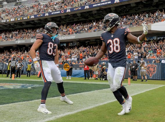 Chicago Bears running back Brittain Brown (38) celebrates his third quarter touchdown against the Cleveland Browns with Chicago Bears wide receiver JP Richardson (83) during a preseason game at Soldier Field in Chicago on Saturday, August 15, 2026. The Bears defeated the Brown 34-10.  CHI20260815117 MARKxBLACK