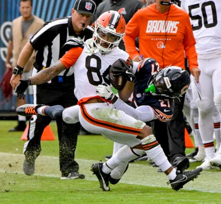 Cleveland Browns wide receiver Gage Larvadain (84) is tackled by Chicago Bears Dontae Davis (27) during a preseason game at Soldier Field in Chicago on Saturday, August 15, 2026. The Bears defeated the Brown 34-10.  CHI20260815125 MARKxBLACK