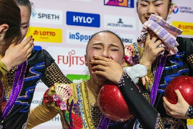 August 15, 2026, Frankfurt, Hesse, Germany: Japan team members, including HANAMURA Natsumi NATSUMI, MANABE RIN, NISHIMOTO MEGUMI, TAGUCHI HISANO, TANABE KASENO, and TANAKA YUNA, pose with their silver medals after finishing second in the 42nd Rhythmic gymnastics, Rhythmische Sportgymnastik, RSG World Championships group all-around finals in the Festhalle in Frankfurt, Hesse, Germany on Saturday, August 15, 2026. 2026 Rhythmic Gymnastics World Championships Group All-Around Finals  - ZUMAd168 20260815_zsp_d168_030 Copyright: xKaixDambachx