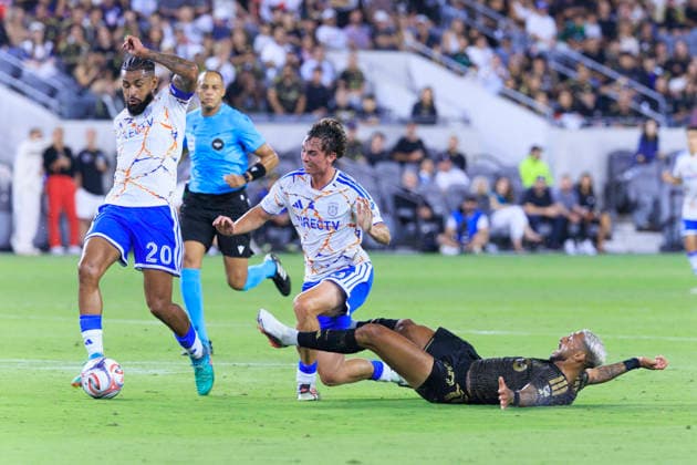 August 15, 2026, Los Angeles, California, USA: Denis Bouanga 99 of the Los Angeles Football Club falls as Anibal Godoy 20 and Oscar Verhoeven 33 of the San Diego FC attempt to steal the ball during their regular season MLS, Fussball Herren, USA game on Saturday August 15, 2026 at the BMO Stadium in Los Angeles, California. LAFC lose to San Diego FC, 0-1. ARIANA RUIZ PI Los Angeles USA - ZUMAp124 20260815_zaa_p124_015 Copyright: xArianaxRuizx
