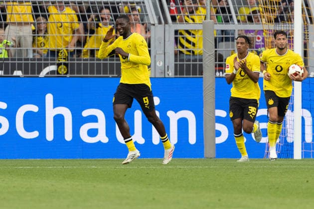 (260816) -- DORTMUND, Aug. 16, 2026 -- Serhou Guirassy (L) of Borussia Dortmund celebrates scoring during a friendly football match between Borussia Dortmund of Germany and Roma of Italy in Dortmund, Germany, Aug. 15, 2026. (Photo by Xinhua) (SP)GERMANY-DORTMUND-FOOTBALL-FRIENDLY-DORTMUND VS ROMA JoachimxBywaletz 