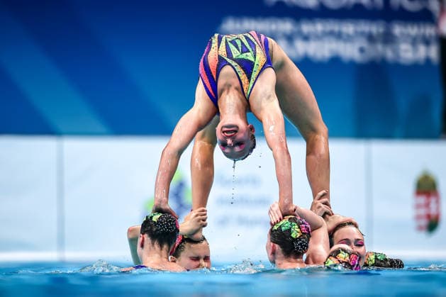 (260816) -- BUDAPEST, Aug. 16, 2026 -- Members of Team Belarus perform during the Team Acrobatic Final of the World Aquatics Junior Artistic Swimming Championships in Budapest, Hungary, on Aug. 15, 2026. (Photo by Xinhua) (SP)HUNGARY-BUDAPEST-ARTISTIC SWIMMING-WORLD JUNIOR CHAMPIONSHIPS-TEAM ACROBATIC DavidxBalogh 