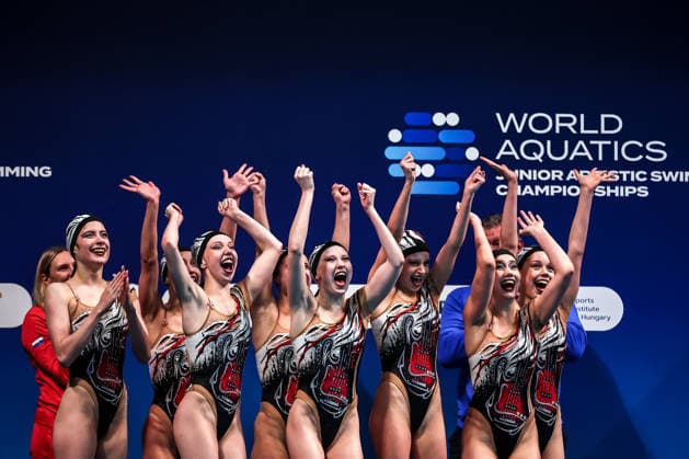 (260816) -- BUDAPEST, Aug. 16, 2026 -- Members of Team Russia celebrate after winning the Team Acrobatic Final of the World Aquatics Junior Artistic Swimming Championships in Budapest, Hungary, on Aug. 15, 2026. (Photo by Xinhua) (SP)HUNGARY-BUDAPEST-ARTISTIC SWIMMING-WORLD JUNIOR CHAMPIONSHIPS-TEAM ACROBATIC DavidxBalogh 