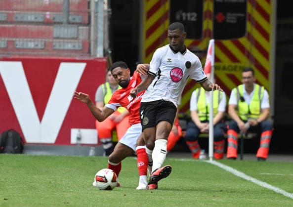 15.08.2026, xsltx, Fussball Testspiel, FSV Mainz 05 - AFC Bournemouth v.l. Phillipp Mwene (1. FSV Mainz 05), Rayan (AFC Bournemouth) (DFL DFB REGULATIONS PROHIBIT ANY USE OF PHOTOGRAPHS as IMAGE SEQUENCES and or QUASI-VIDEO) *** August 15, 2026, xsltx, Soccer Friendly Match, FSV Mainz 05 vs. AFC Bournemouth, Phillipp Mwene 1 FSV Mainz 05, Rayan AFC Bournemouth. DFL and DFB regulations prohibit any use of photographs as image sequences and or quasi-video.