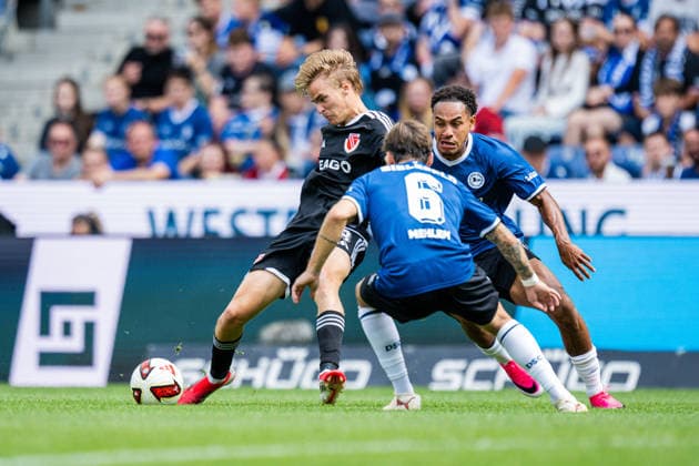 16.08.2026 - Fußball, 2026 2027, 2. Bundesliga, 2. Spieltag, DSC Arminia Bielefeld - FC Energie Cottbus: (L-R) Lukas Michelbrink (Cottbus), Sam Schreck (Bielefeld), Monju Momuluh (Bielefeld) DFL REGULATIONS PROHIBIT ANY USE OF PHOTOGRAPHS AS IMAGE SEQUENCES AND OR QUASI-VIDEO. *** August 16, 2026 Soccer, 2026–2027, 2. Bundesliga, Matchday 2, DSC Arminia Bielefeld vs. FC Energie Cottbus; Referee: Lukas Michelbrink (Cottbus), Assistant Referees: Sam Schreck (Bielefeld) and Monju Momuluh (Bielefeld). DFL regulations prohibit any use of photographs as image sequences and or quasi-video.