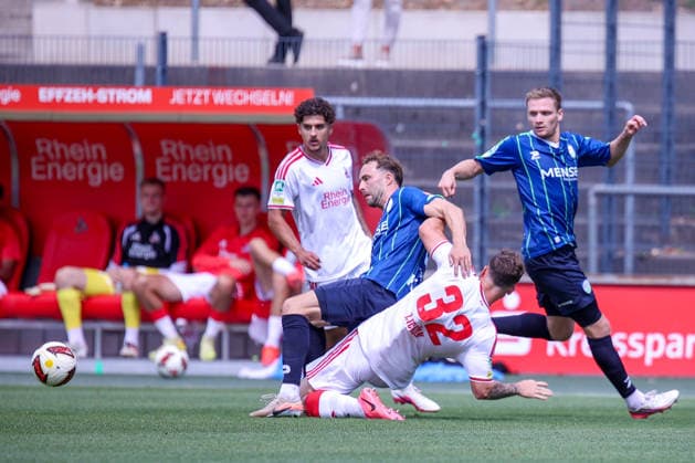 16.08.2026, xsefx, Fußball, 1.FC Köln II U21, U 21 - FC Gütersloh, Regionalliga West, Franz-Kremer-Stadion, 3. Spieltag, Saison 2026 2027: Luis Stapelmann (1FC Köln II 32) im Zweikampf gegen Julius Langfeld (FC Gütersloh 10) DFB regulations prohibit any use of photographs as image sequences and or quasi-video. Nordrhein-Westfalen Deutschland *** August 16, 2026, xsefx, Soccer, 1. FC Köln II vs. U21 FC Gütersloh, Regionalliga West, Franz Kremer Stadium, Matchday 3, 2026–2027 Season: Luis Stapelmann (1. FC Köln II, No. 32) in a tackle against Julius Langfeld (FC Gütersloh, No. 10). DFB regulations prohibit any use of photographs as image sequences and or quasi-video. North Rhine-Westphalia, Germany